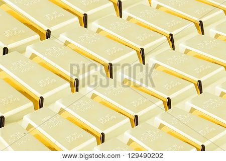Stack of shiny gold bars / ingots in the central vault / storage room. National currency / treasury / gold reserved concept.