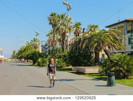Viareggio Italy - June 28 2015: Tourists walking on the street. Viareggio is the famous resort on the coast of the Ligurian Sea. Province Lucca Tuscany region of Italy