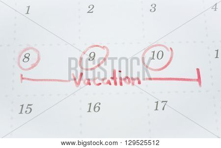 vacation plan written on a Calendar. (holiday concept)
