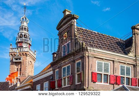 Monnickemdam Holland - July 24 2014: Waterland district a palace and the Parish curcu bell tower in the old town
