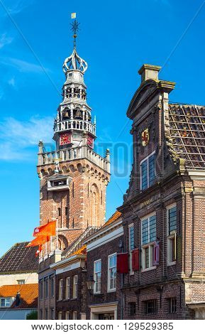 Monnickemdam Holland - July 24 2014: Waterland district a palace and the Parish curcu bell tower in the old town