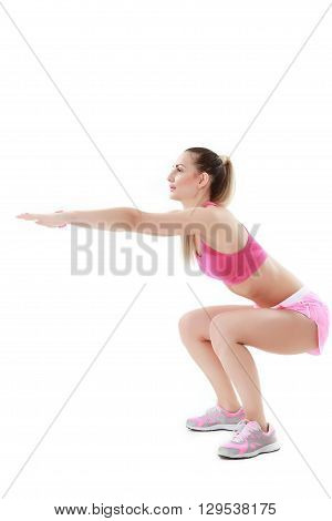 Portrait of young woman doing stretching exercise