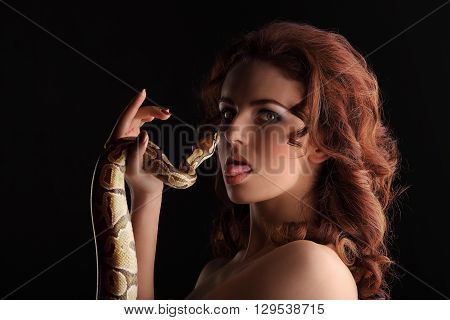 Sexy Brunette Girl With Orange Python Around Her Neck