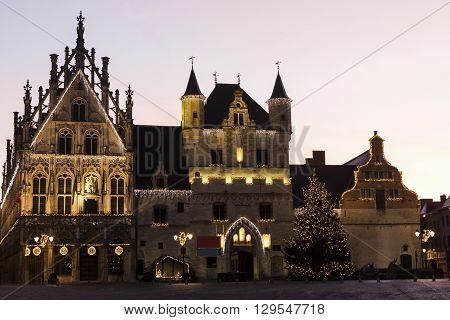 The Palace of the Great Council and the unfinished Gothic Belfry on the Grote Markt in Mechelen in Belgium
