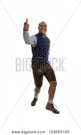 Isolated colored man in bavarian tradition clothes making thumbs up gesture isolated over white background.