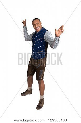 Shocked and wondering isolated colored man wearing traditional bavarian clothes.