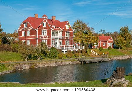BORENSBERG, SWEDEN - OCTOBER 12, 2010: Gota Canal and Gota Hotel on in Borensberg. The canal contributes to a 390 km long waterway with 58 locks connecting the Swedish west coast with the east coast.