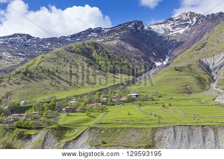 Mountain landscape in Georgia Kaukaz with beautiful sky
