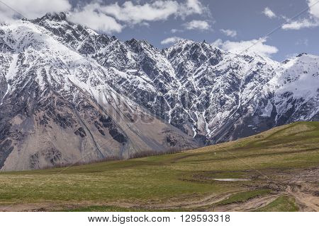 Mountain Landscape In Georgia Kaukaz With Beautiful Sky