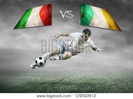 Football player on soccer field of stadium. Match between two national teams