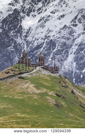 Georgia, Stepantsminda-sameba. Ancient Gergeti Trinity Church High In The Mountains.