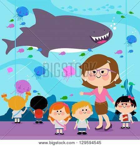 Students and their teacher visiting the oceanarium