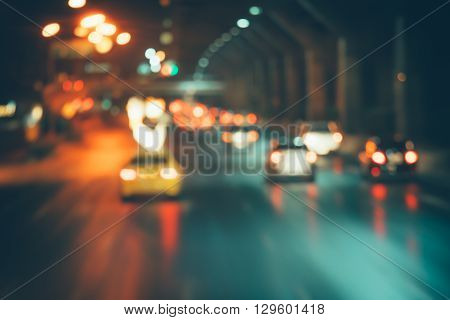 Night traffic light blurred for background , retro effect