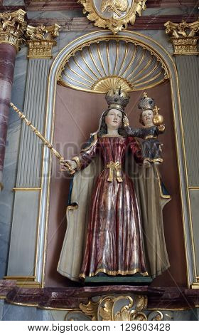 PRIMISWEILER, GERMANY - OCTOBER 20: Virgin Mary with baby Jesus, church of St. Clement in Primisweiler, Germany on October 20, 2014.