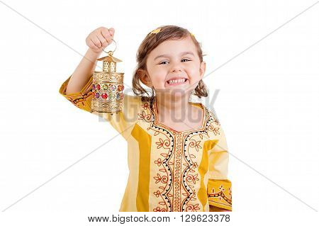 Ramadan Kareem - Happy young girl celebrating Ramadan with her lantern