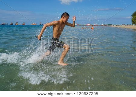 Labuan,Malaysia-April 30, 2016:The Cross Channel Swimming Outdoor 2016 athlete in action at Labuan International Sea Sports Complex at Labuan,Malaysia on 30th April 2016.
