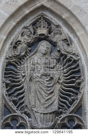 TUBINGEN, GERMANY - OCTOBER 21: Virgin Mary with baby Jesus, Collegiate Church of St. George in Tubingen, Germany on October 21, 2014.
