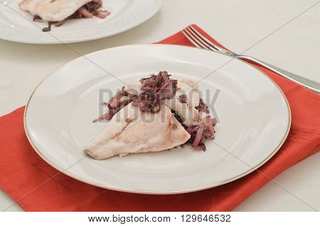 Fish bream with red radicchio di Treviso