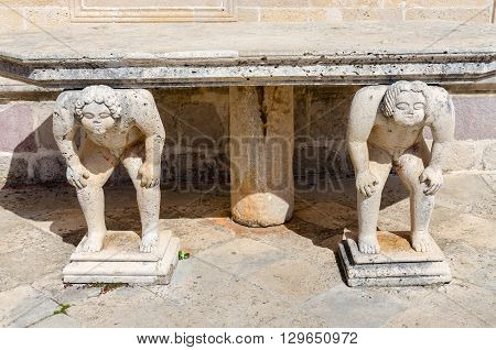 PERAST MONTENEGRO - SEPTEMBER 16 2015: Sculpture of the Atlanteans at the church on the Island of Virgin Mary on the Reef (the Island of Our Lady of the Rocks) Montenegro