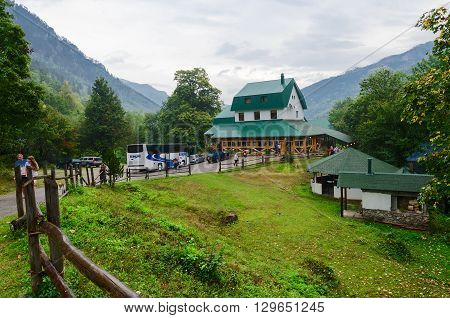 KOLASIN MONTENEGRO - SEPTEMBER 20 2015: Unidentified tourists visit the restaurant during a sightseeing trip in Kolasin Montenegro