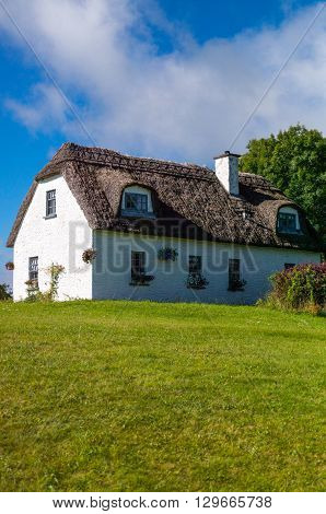Calway Ireland - August 4 2013: Traditional country houses in the Dunguaire castle area