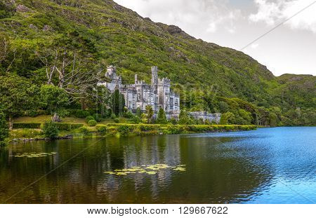 Calway Ireland - August 4 2013: Connemara area the Kylemore abbey on the Pollacappul lake