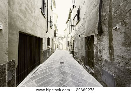 Narrow Alley with Old Buildings in Italian City Vintage Style Toned Picture