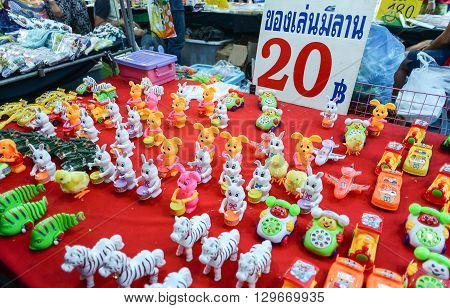 That Phanom Thailand - February 22 2016 : Toys for sale at market zone of That Phanom's Makhabucha day fair