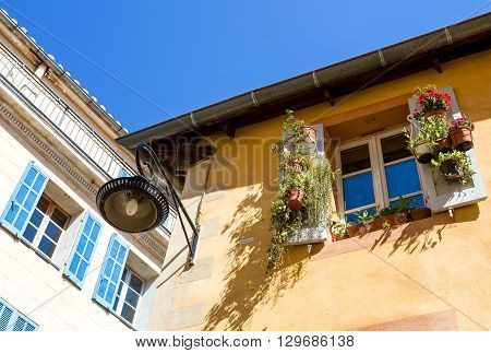 France Marseille upward view of a window with flowers in the old district Le Panier