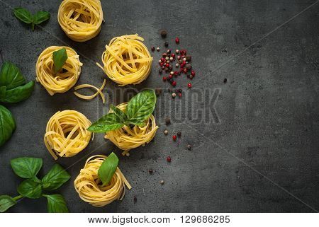 Ingredients for cooking Italian pasta. Top view with space for taxt.