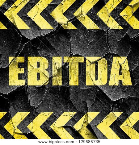 ebitda, black and yellow rough hazard stripes