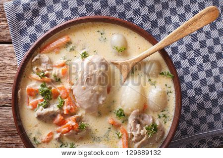 Belgian Hot Cream Soup With Chicken Waterzooi Close Up In A Bowl. Horizontal Top View