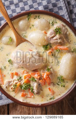 Belgian Waterzooi Soup With Chicken Close Up In A Bowl. Vertical Top View