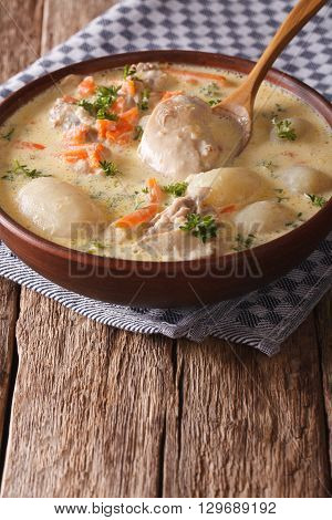 Belgian Hot Cream Soup With Chicken Waterzooi Close Up In A Bowl. Vertical