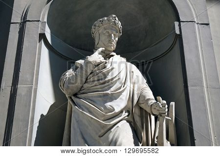FLORENCE, ITALY - JUNE 05: Dante Alighieri in the Niches of the Uffizi Colonnade. The first half of the 19th Century they were occupied by 28 statues of famous people in Florence, on June 05, 2015