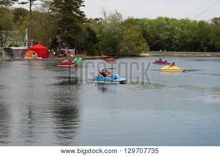 Smithville, New Jersey  USA  May 14, 2016 Paddleboats in the lake at Smithville Mayfast