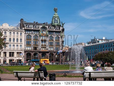 St. Petersburg Russia - May 8 2016: -Singer- of the company's famous home. Now the bookstore is located in the building -House of Books-. View from the square in front of the Kazan Cathedral. In the foreground fountain.