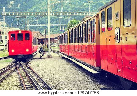 Wilderswil Switzerland - July 08 2012: Retro passenger trains stan after arrival from Schynige Platte.