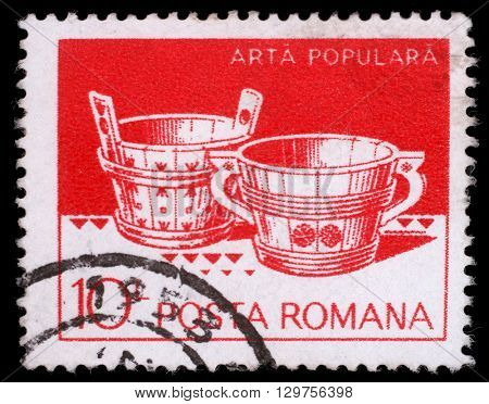 ZAGREB, CROATIA - JULY 19: A stamp printed in Romania shows Wooden tubs from Hunedoara and Suceava, circa 1982, on July 19, 2012, Zagreb, Croatia