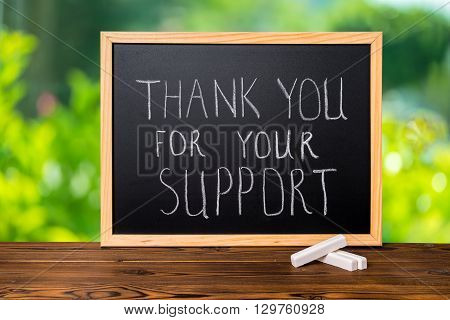 Handwriting Text Thank You For Your Support Is Written In Chalkboard On Green Light Background And R