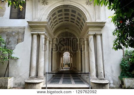 ROME ITALY - MAY 1 2016: Palazzo Spada the forced perspective gallery by Francesco Borromini. The baroque corridor is only nine metres long but looks much longer