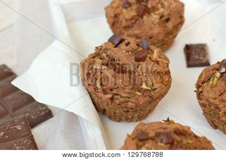 Chocolate Muffins On The White And Pink Background