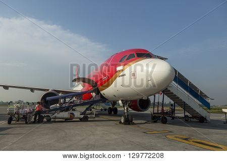 YOGYAKARTA INDONESIA - MARH 20 2016 Air Asia at Yogyakarta Airport. Air Asia company is the largest low cost airlines in Asia
