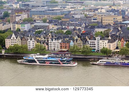 Cologne, Germany - May 17: This is old region of town where Cologne River Station and the waterfront Frankenwerft May 17, 2013 in Cologne, Germany.