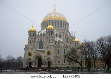 KRONSTADT, RUSSIA - MARCH 08, 2016: View of the Cathedral of St. Nicholas misty march afternoon. Historical landmark of the city Kronstadt