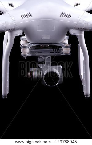 Unmanned aerial vehicle, drone on isolated background, quadrocopter designed for photo and video shooting. White quadrocopter camera.