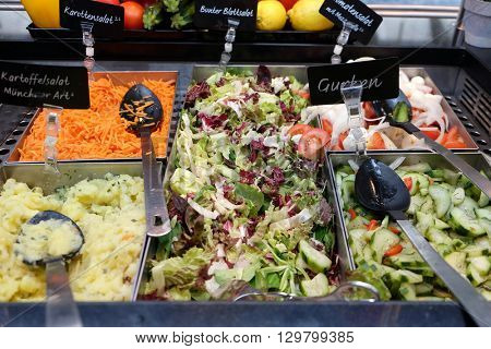 PENTLING, GERMANY - JUNE 07: Salad bar in highway restaurant in Pentling, Germany on June 07, 2015.
