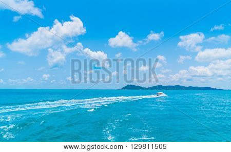 Trail on sea water surface behind  boat