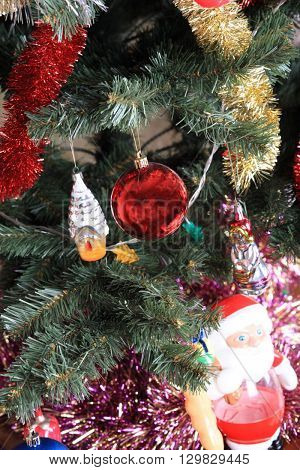 image of many toys on new year fir tree