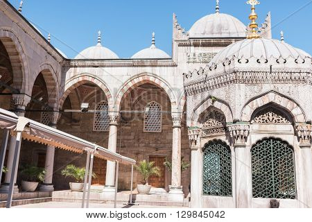 against the blue sky beautiful dome of a mosque in Turkey